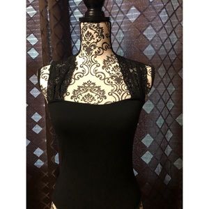 In the dark body suit